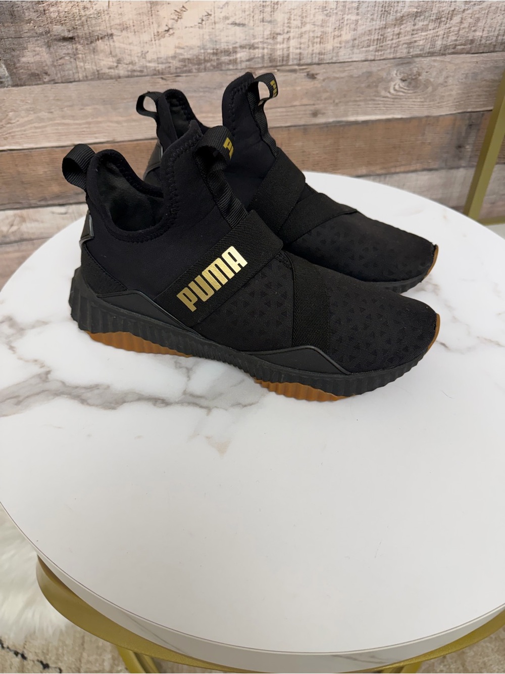 Puma Black Slip-On Sneakers with Gold Accents - Picture 2 of 5